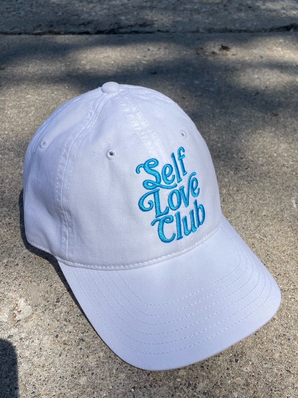 Mighty Fine White Baseball Cap with Turquoise "Self Love Club" Embroidery